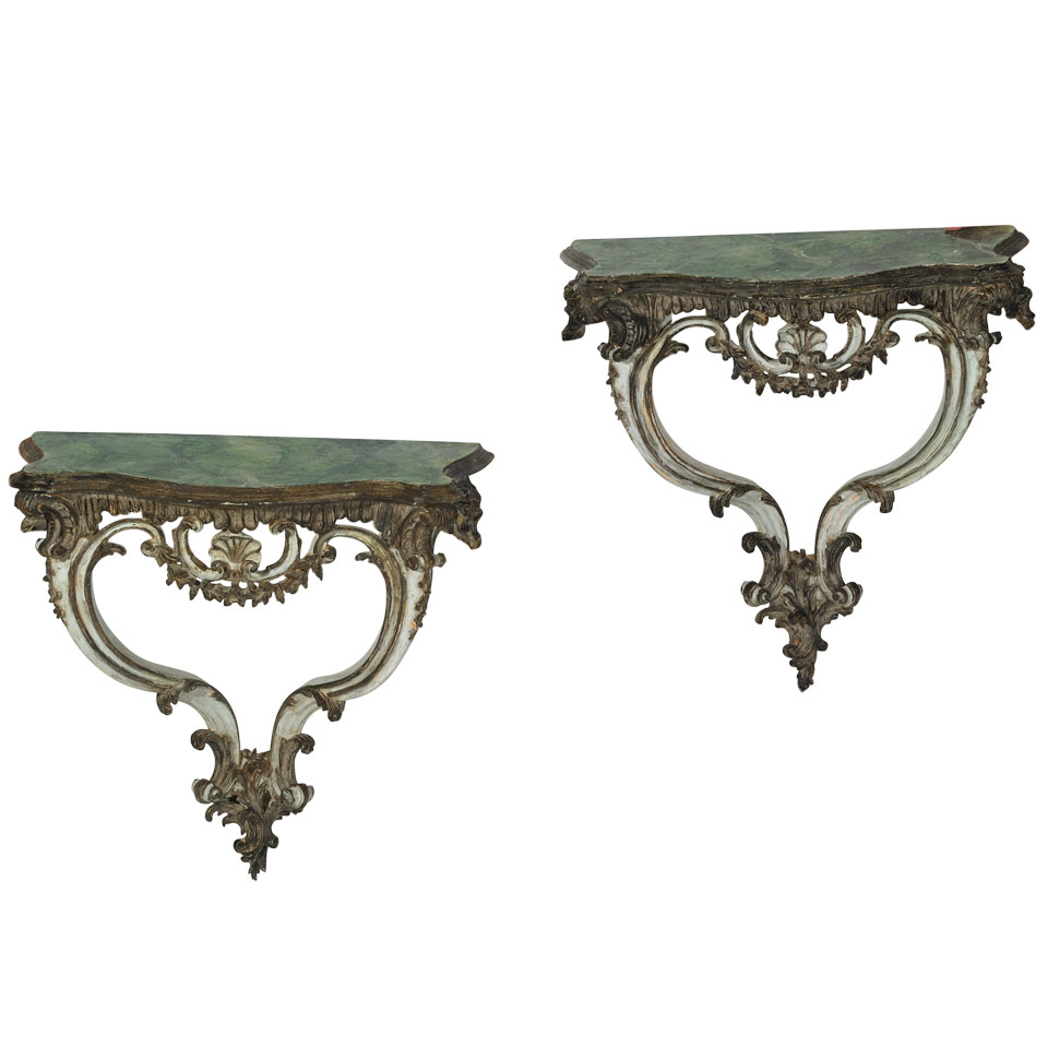 Appraisal: Pair of Italian Carved and Silvered Wood Console Tables with