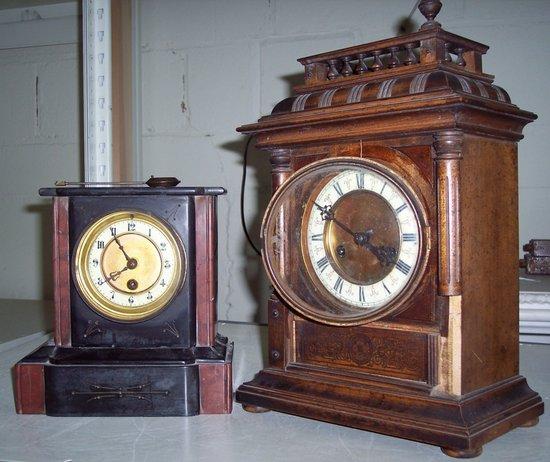 Appraisal: A black marble mantel clock cm high and another clock