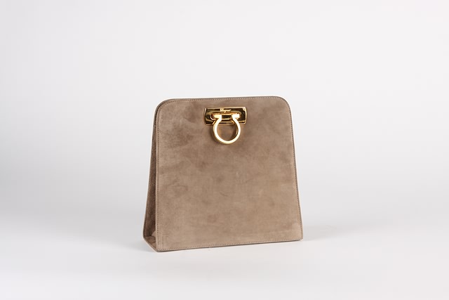 Appraisal: Salvatore Ferragamo taupe suede handbag with gold shoulder strap and