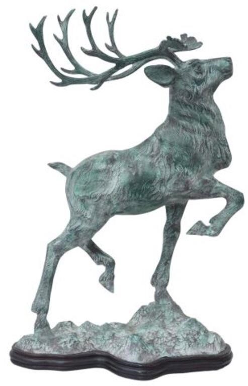 Appraisal: Verdigris patinated bronze sculpture Stag rising on conforming wood base