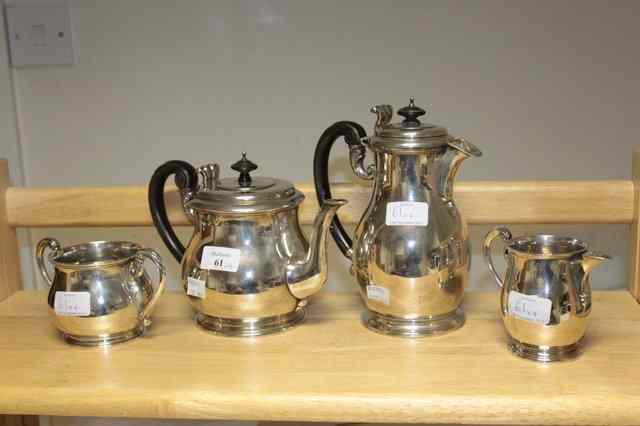 Appraisal: A SILVER FOUR PIECE TEASET consisting of teapot milk jug