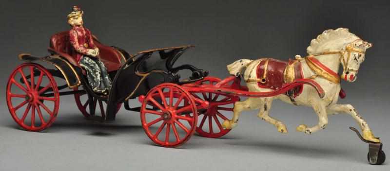 Appraisal: Cast Iron Phaeton Horse-Drawn Toy Description American Made by Pratt