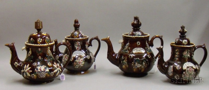 Appraisal: Four Measham Bargeware Earthenware Teapots and Covers England late th