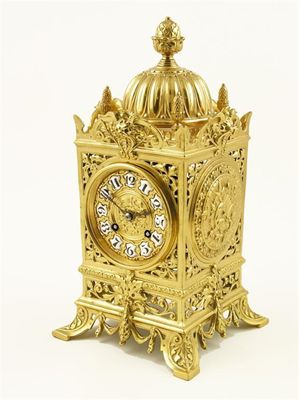 Appraisal: A French gilt brass mantel clock the day movement stamped