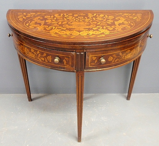 Appraisal: - Fine marquetry inlaid demilune gaming table c with two