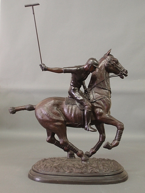 Appraisal: - Large bronze sculpture of a polo horse and rider