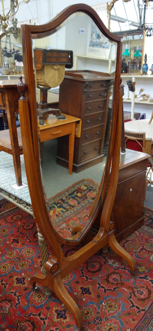 Appraisal: A late th century inlaid mahogany shield shaped cheval mirror