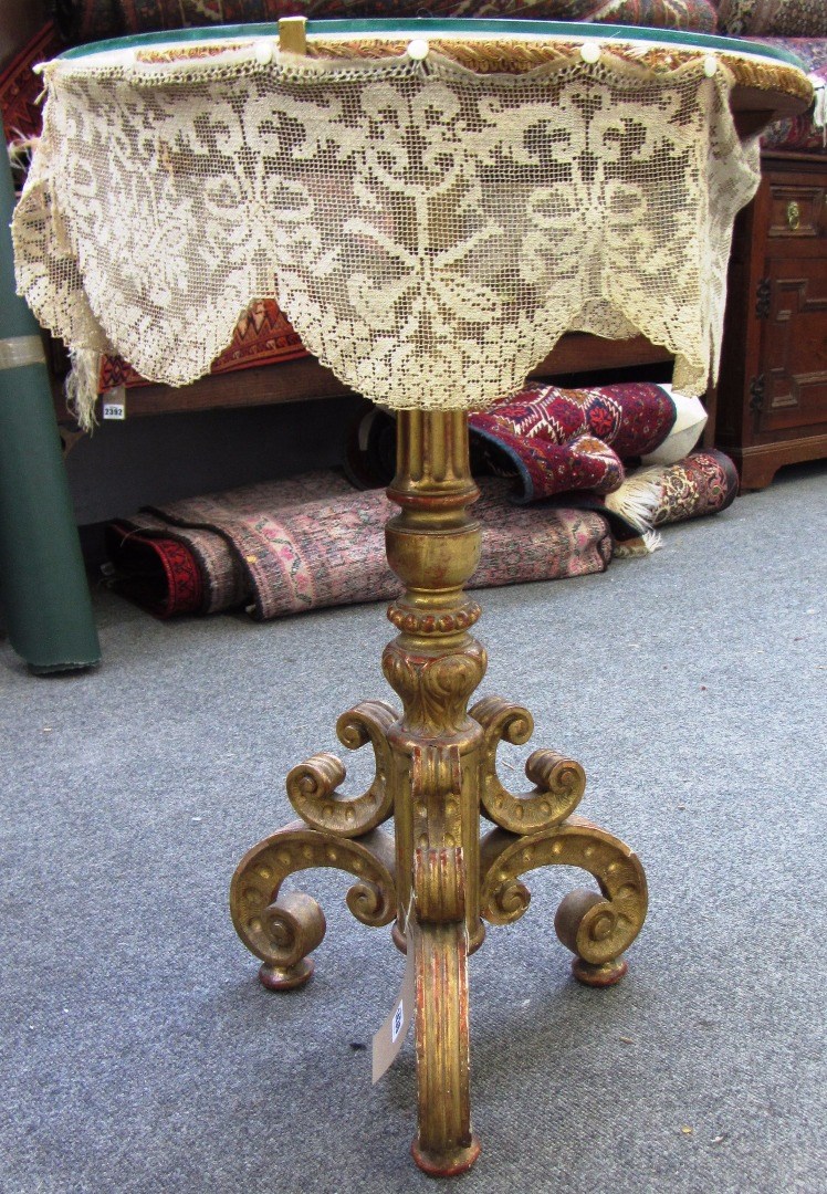 Appraisal: A th century Florentine gilt framed tripod base with opposing