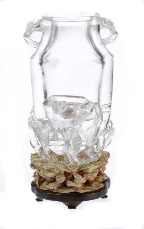 Appraisal: A CHINESE ROCK CRYSTAL VASE with flattened sides and supported