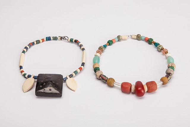 Appraisal: TWO ROWS OF VARYING AGATE GLASS AND STONE BEADS