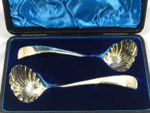 Appraisal: A pair of Georgian silver ladles with silver gilt shell