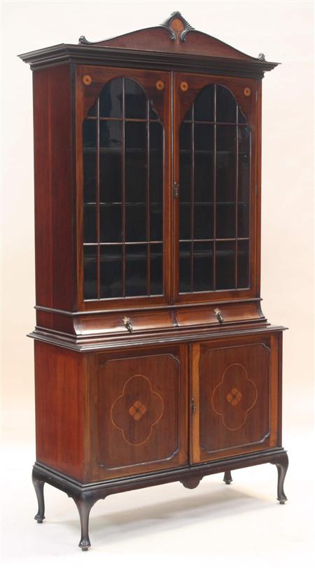 Appraisal: An Edwardian mahogany and inlaid display cabinet the gadrooned arched