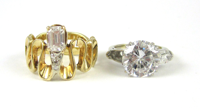 Appraisal: TWO FAUX DIAMOND AND FOURTEEN KARAT GOLD RINGS including a