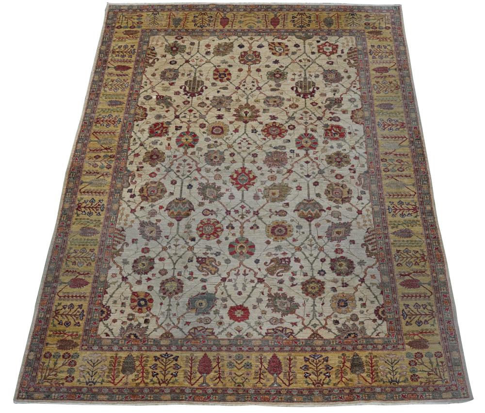 Appraisal: PAKISTANI PERSIAN-STYLE RUGwool beige field Provenance The Estate of Arthur