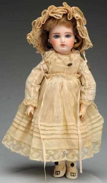 Appraisal: Dainty Belton Style Child Doll German bisque socket head with