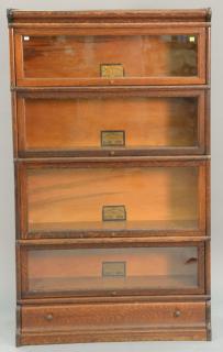 Appraisal: Oak globe Wernicke four section barrister bookcase with drawer ht