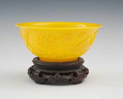 Appraisal: A Yellow Peking Glass Bowl Opaque egg-yolk color yellow glass