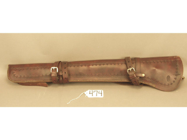 Appraisal: Well made leather rifle scabbard with shoulder straps stamped O