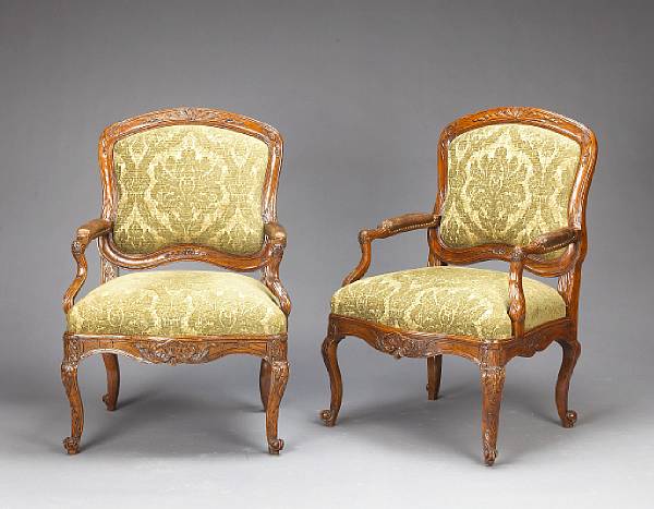 Appraisal: A good pair of Louis XV walnut fauteuils a la