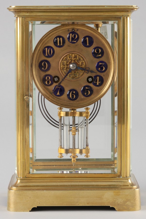 Appraisal: Clock with blue enamel numbers beveled glass sides French works