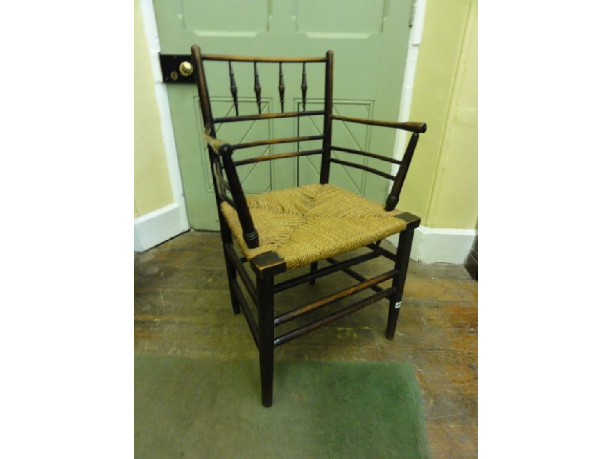 Appraisal: A William Morris Suffolk style armchair in ashwood and beechwood