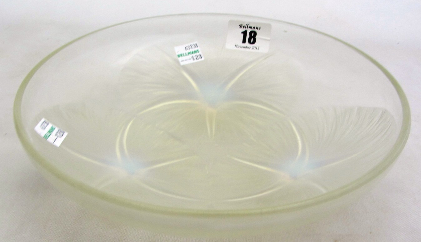 Appraisal: A Lalique clear and frosted glass bowl on three flower