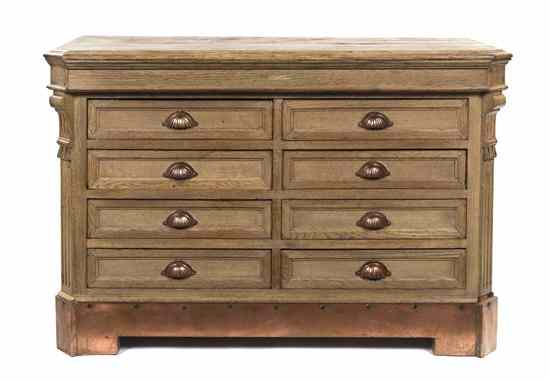 Appraisal: A Continental Oak Chest of Drawers having a rectangular top