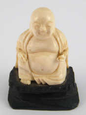 Appraisal: An okimono of Buddha circa with hardwood stand