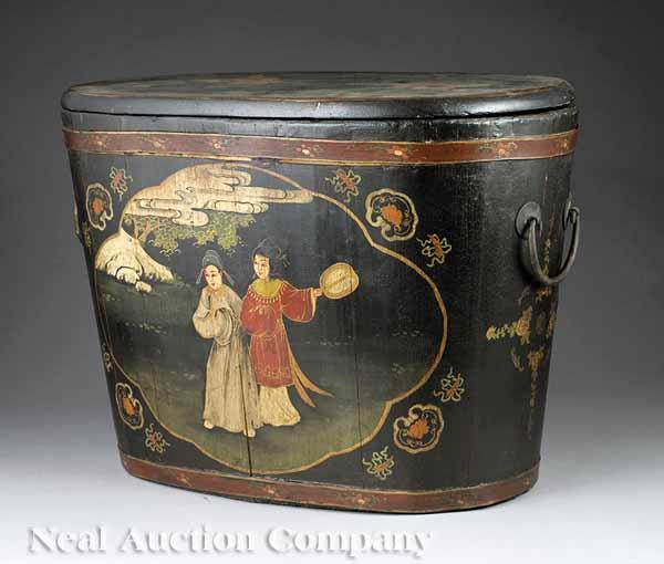 Appraisal: A Chinese Oval Lidded Wooden Shipping Box with Carrying Handles