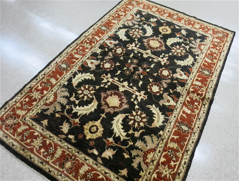 Appraisal: HAND KNOTTED ORIENTAL CARPET Pakistani Persian overall floral design on