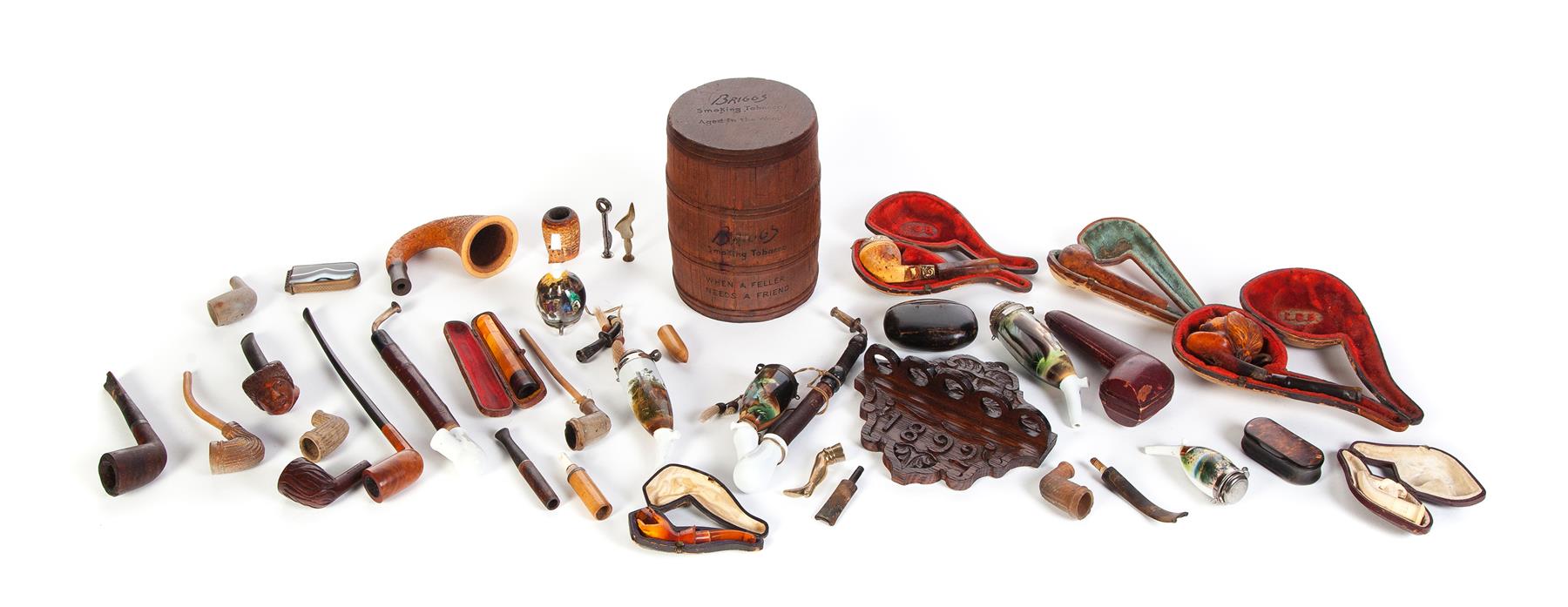 Appraisal: PIPE RACK TOBACCO KEG AND A GROUP OF SMOKING PIPES