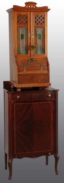 Appraisal: Klingsor Upright Music Changer Description Oak with mahogany cabinet Stringed