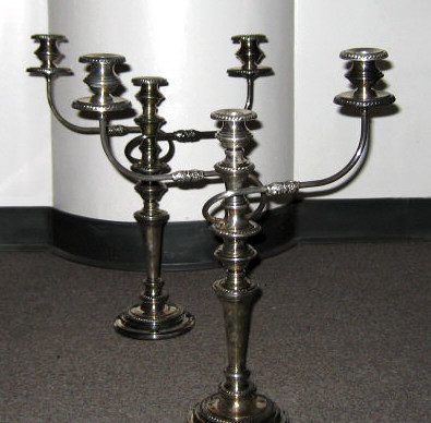 Appraisal: PAIR OF PLATED SILVER THREE-LIGHT CANDELABRA Georgian style trumpet form