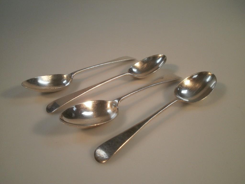 Appraisal: Four George V Old English pattern table spoons Sheffield oz