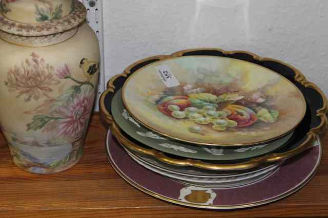 Appraisal: A MINTON PLATE with painted still life of grapes and