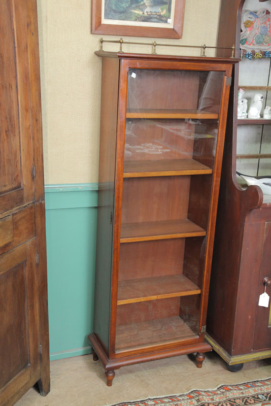 Appraisal: BOOKCASE Dark stained walnut with a single glazed door and