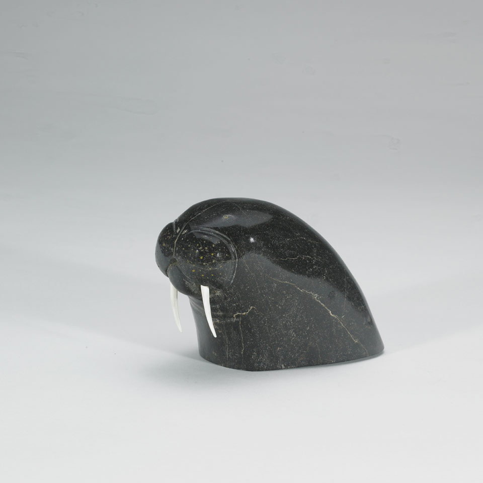 Appraisal: Unidentified HEAD OF A WALRUS stone bone height x width