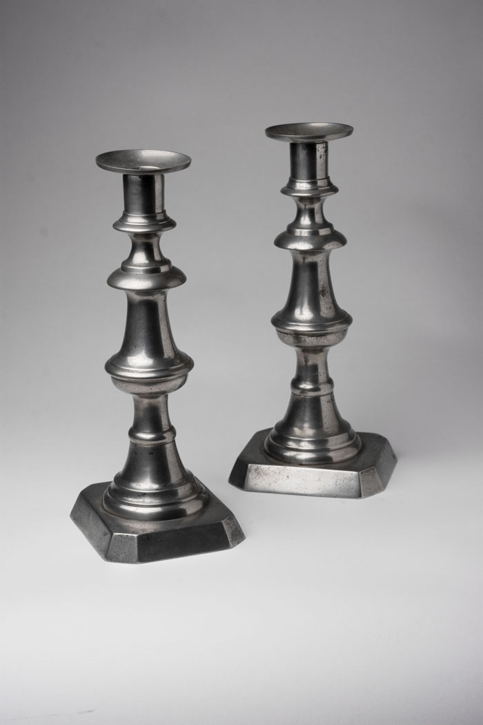 Appraisal: PAIR OF PEWTER CANDLESTICKS ENGLAND CIRCA - Slush cast shafts