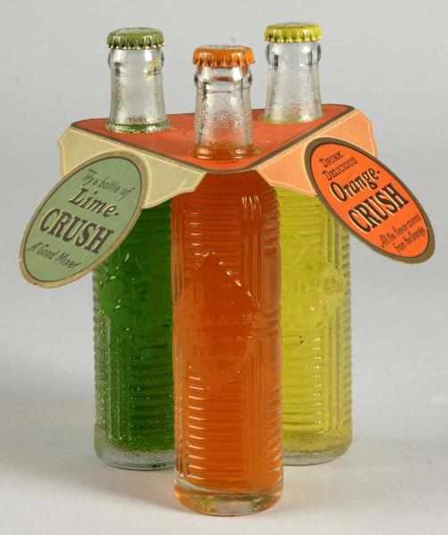 Appraisal: Orange Crush Bottle Triangle Display Description s Light cardboard construction