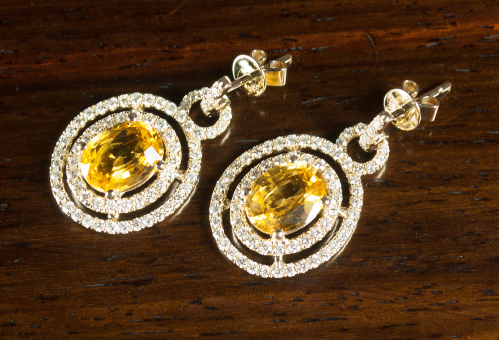 Appraisal: PAIR OF YELLOW SAPPHIRE AND DIAMOND EARRINGS each k yellow