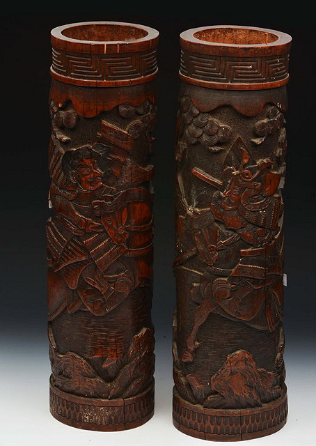 Appraisal: A PAIR OF JAPANESE TALL BAMBOO CYLINDRICAL VASES fighting Samurai