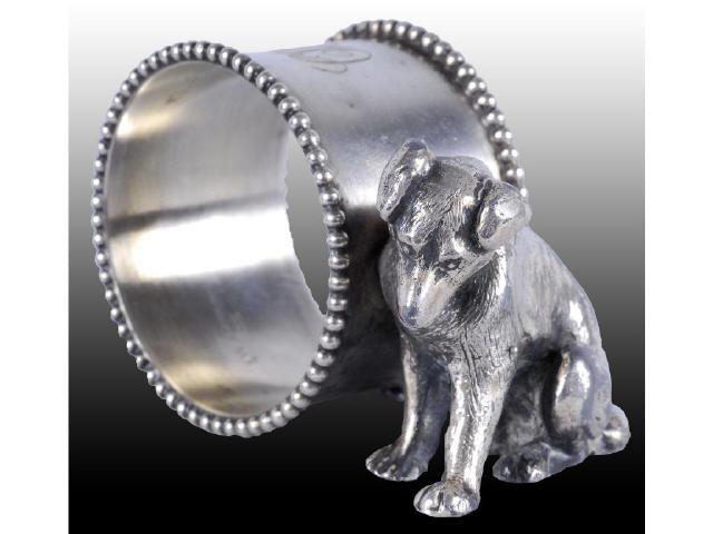 Appraisal: Small Dog Sitting Figural Napkin Ring Description Small dog sits