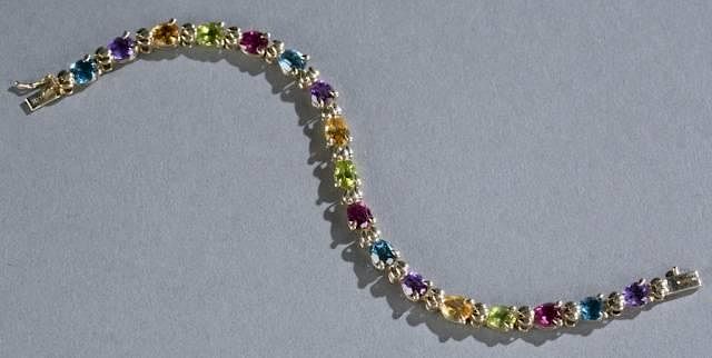 Appraisal: Multi stone pear cut tennis bracelet kt yellow A multi-stone