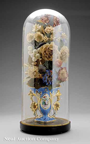 Appraisal: A Victorian Silk and Waxwork Floral Arrangement Under a Glass