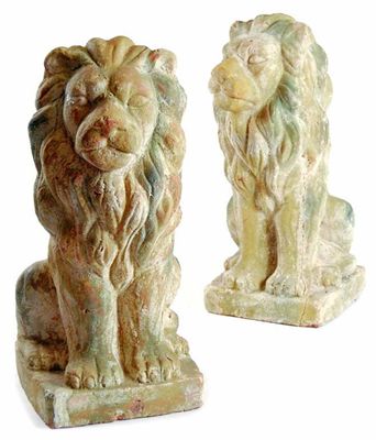 Appraisal: A pair of terracotta seated lions in cm h in