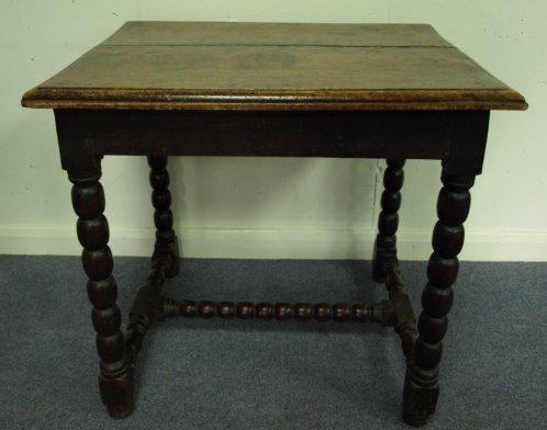 Appraisal: A th Century oak centre table the rectangular top on