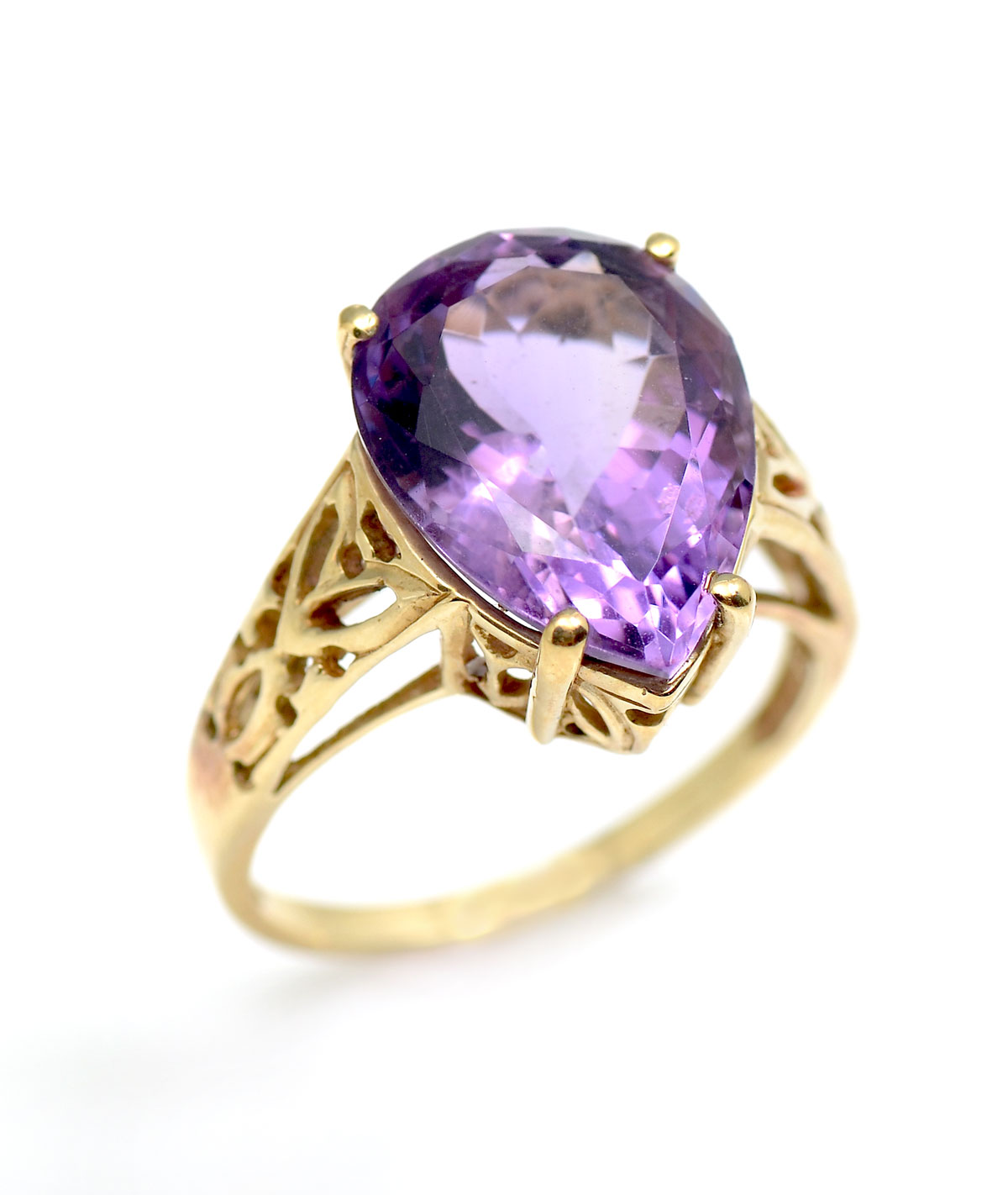 Appraisal: K CT AMETHYST RING K yellow gold ring contains pear