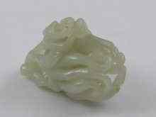 Appraisal: A Chinese jade carving depicting ''the hand of Quan Yin''