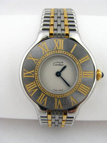 Appraisal: Cartier Lady's Two Tone Quartz Wristwatch round dial sapphire stem