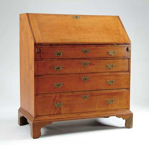 Appraisal: CHIPPENDALE CURLY MAPLE SLANT FRONT DESK Four graduated drawers with